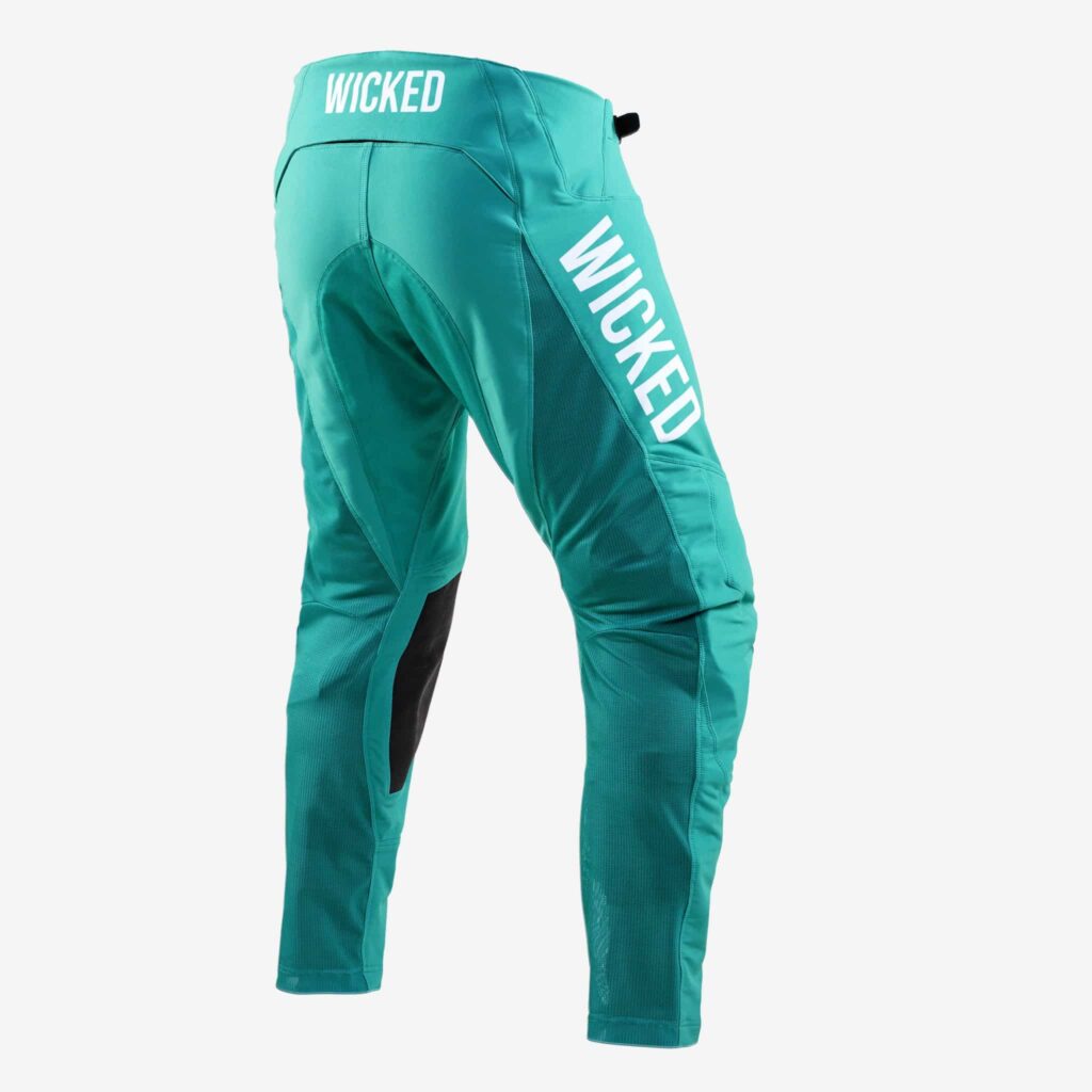 image of the back of teal glory motocross pants