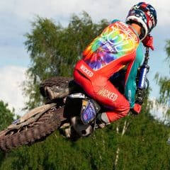 Rider in Tie dye MX combo – teal/red