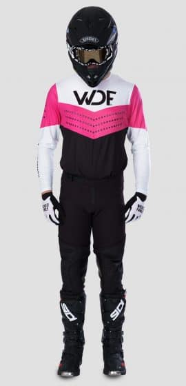 the front image of a man in the block mx gear set pink/black