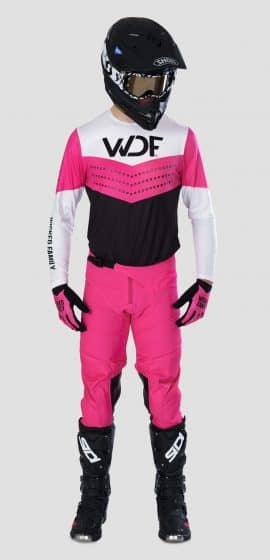 the front image of a man in the block mx gear set pink