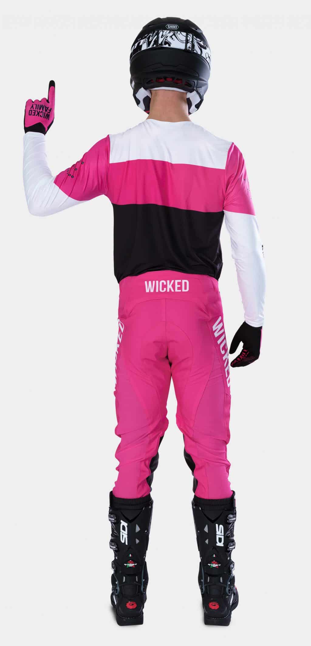 MX rider in pink motocross gear
