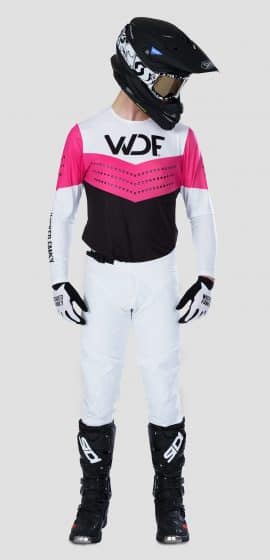 the front image of a man in the block mx gear set pink/white