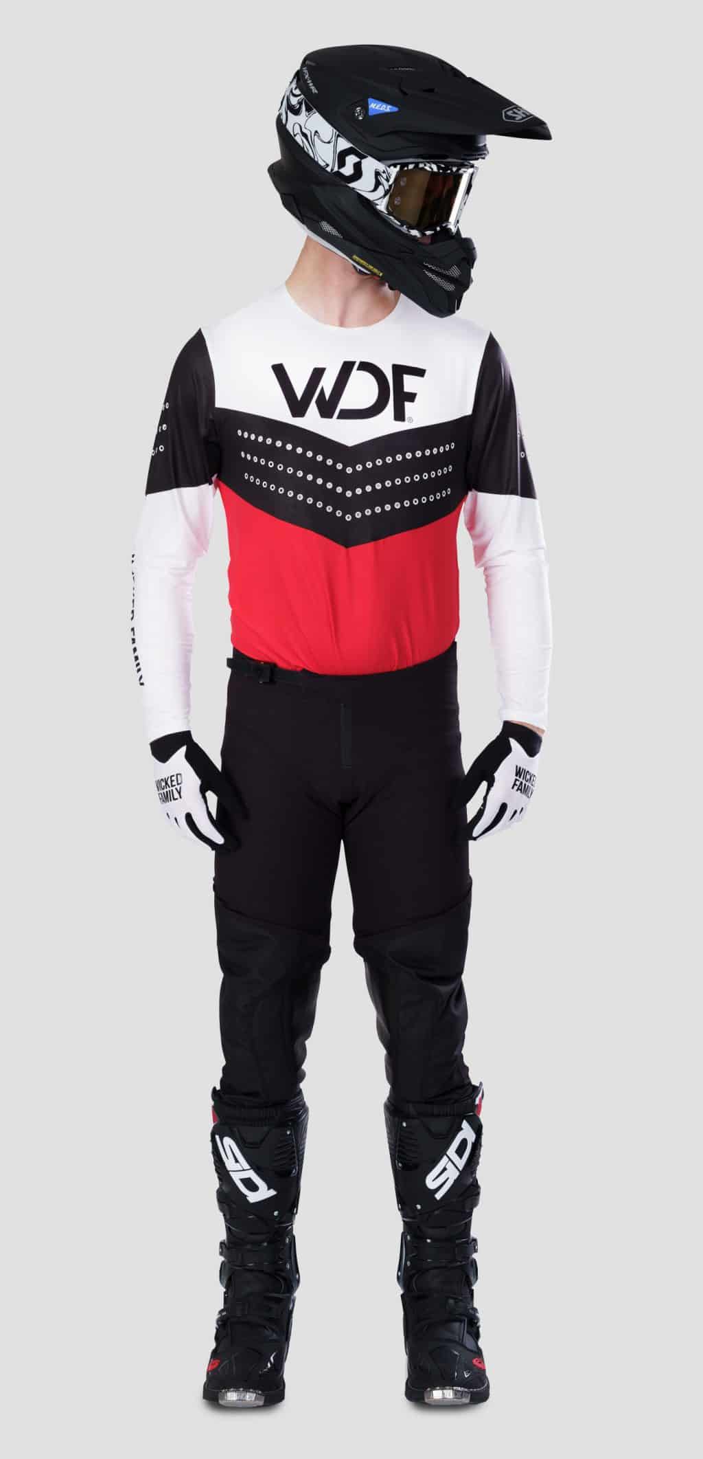 Front of red Block MX gear set with black glory pants