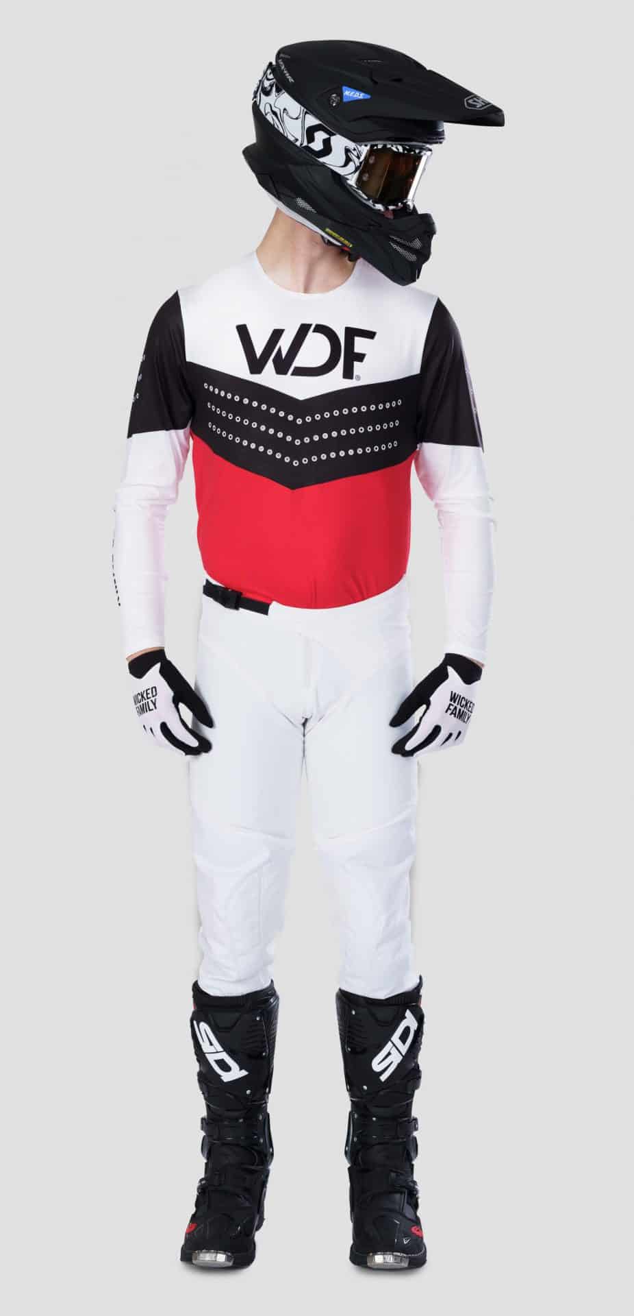 image of a man in red block MX gear set with white glory pants