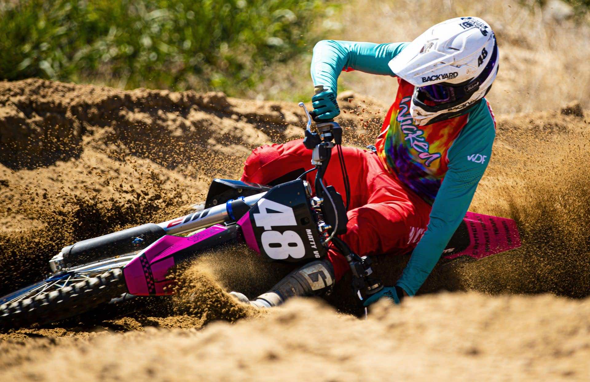 MX rider in a sand curve