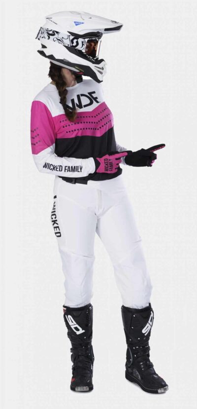 Block womens MX gear pink and white on a woman